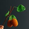 Crochet kiwi branch PDF pattern with free video tutorial for crafting enthusiasts.