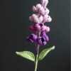 Crochet lilac flower pattern with free video tutorial in PDF format.