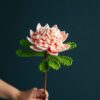 Crochet protea cynaroides PDF pattern with free video tutorial, unique floral design for crafts and projects.